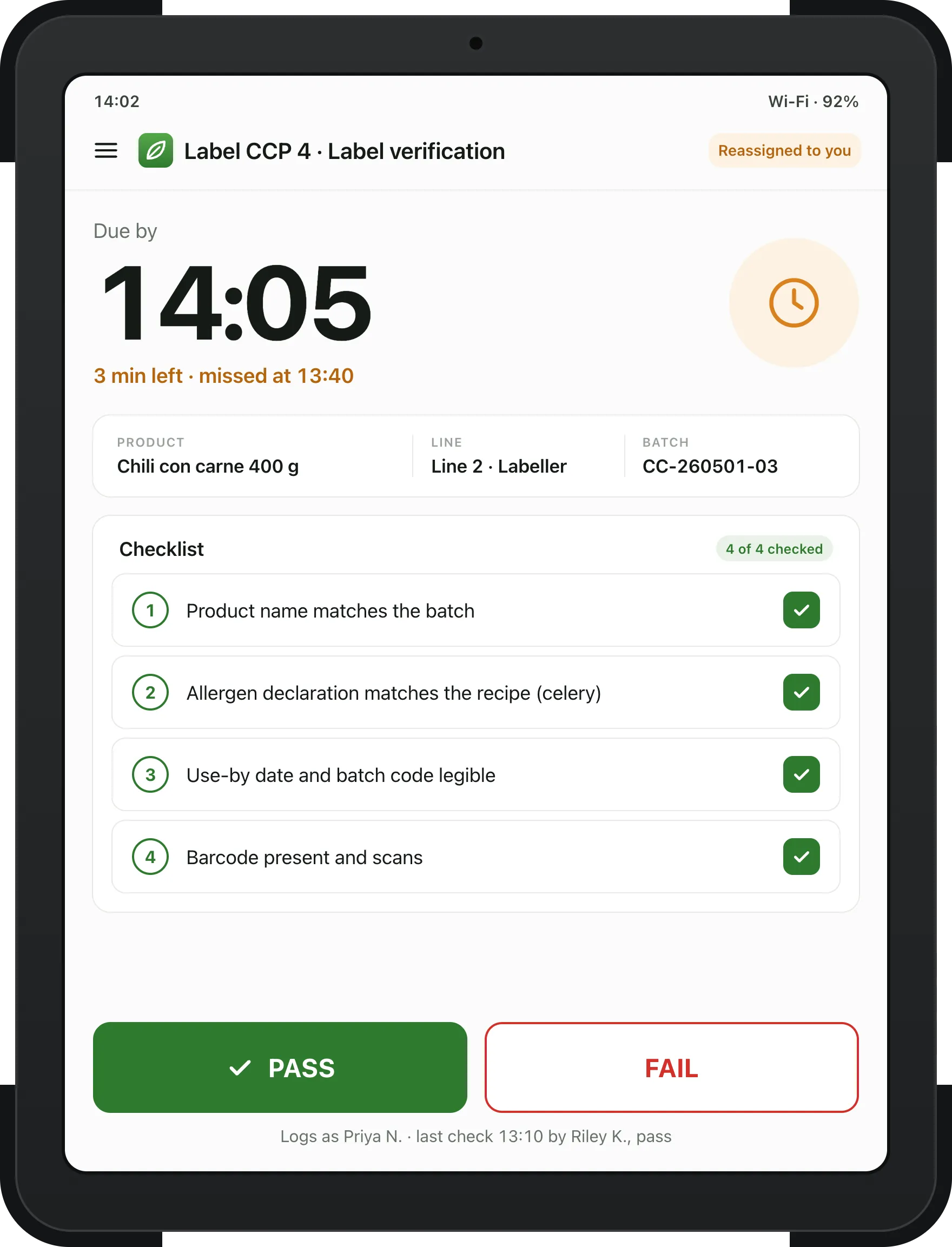 Tablet label verification reassigned to the operator: due by 14:05, product, line and batch, four checklist items all ticked, and Pass and Fail buttons.